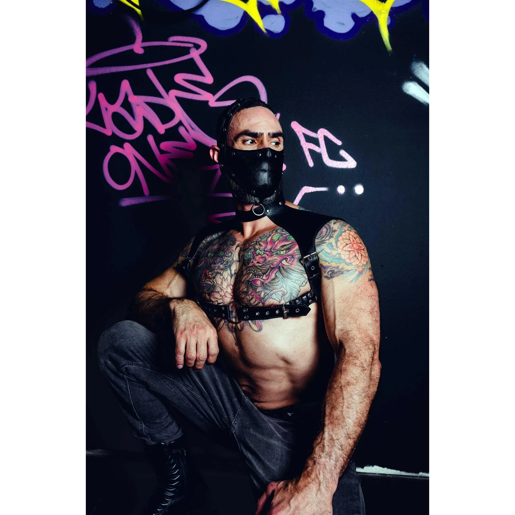 Masked Male posed wearing leather neck harness front view